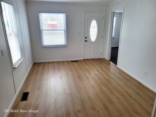 foyer featuring light hardwood / wood-style flooring