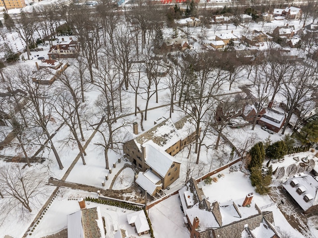 snowy aerial view featuring a residential view