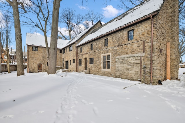 view of snow covered house