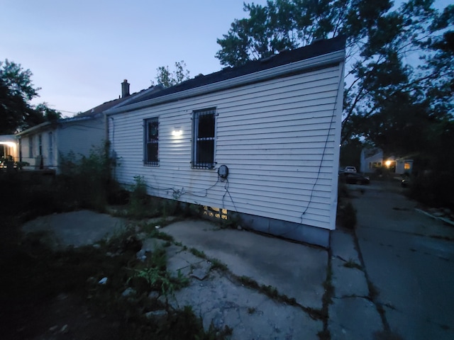 view of property exterior at dusk