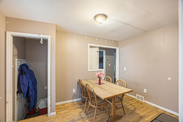 dining area featuring light hardwood / wood-style floors