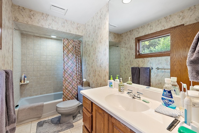 bathroom with toilet, wallpapered walls, visible vents, and tile patterned floors