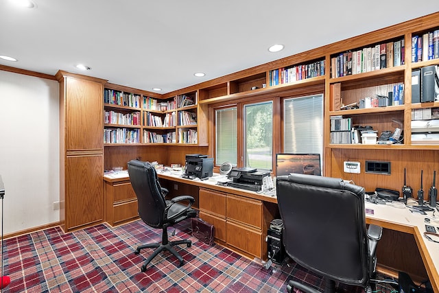 home office with recessed lighting and built in desk