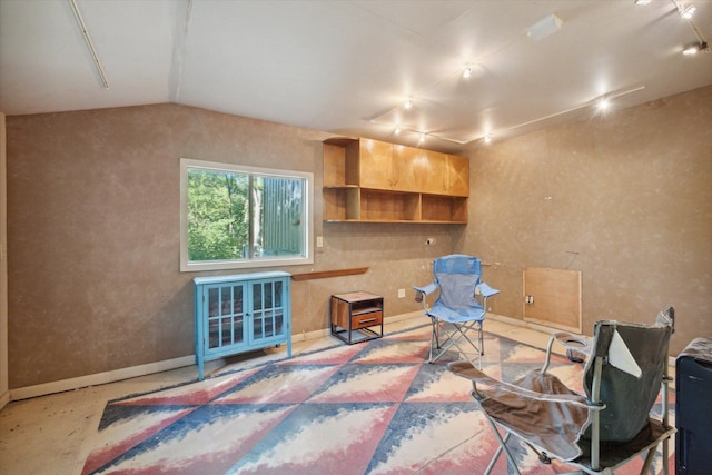 living area with lofted ceiling