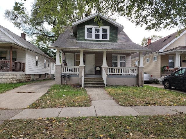 bungalow-style home with a porch