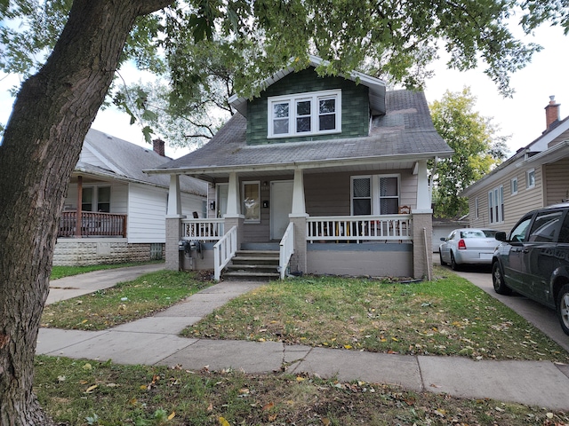 bungalow-style home with a porch