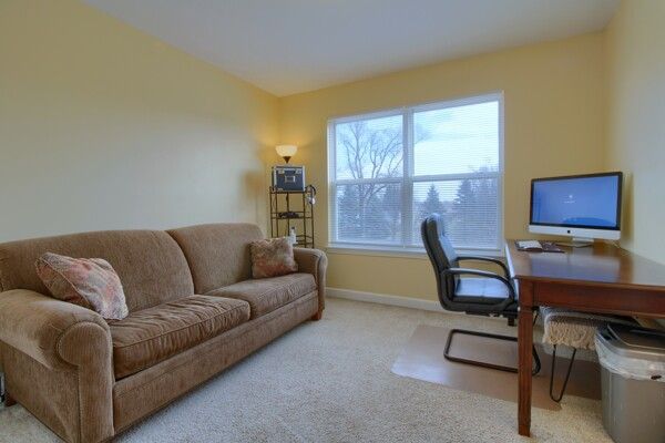 home office with carpet and baseboards