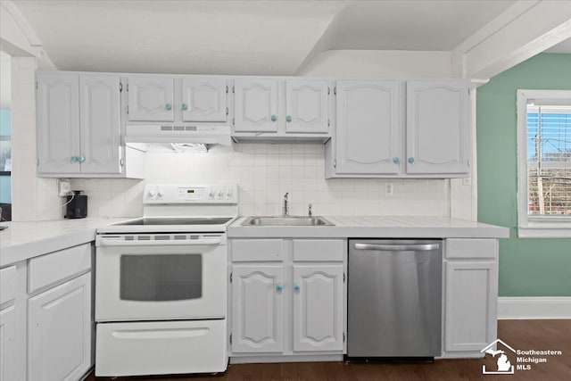 kitchen featuring sink, white range with electric cooktop, stainless steel dishwasher, white cabinets, and decorative backsplash