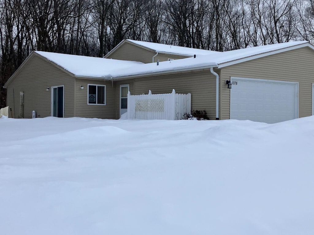 view of front of property featuring a garage