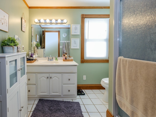 bathroom with ornamental molding, tile patterned flooring, vanity, and toilet