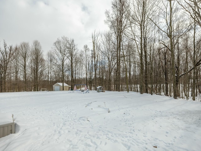 view of yard covered in snow