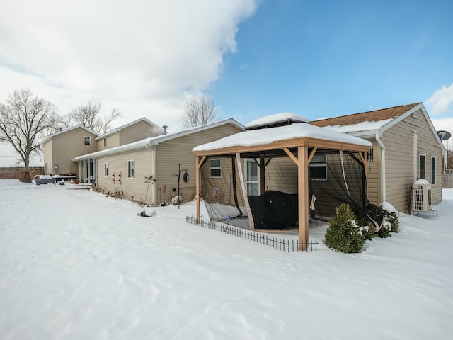 view of snow covered house