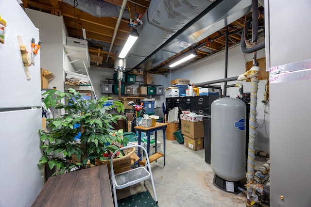 basement with white fridge