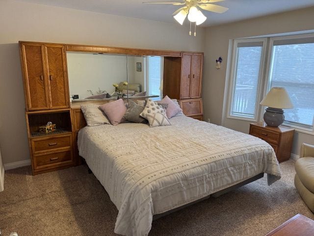 bedroom featuring carpet and ceiling fan