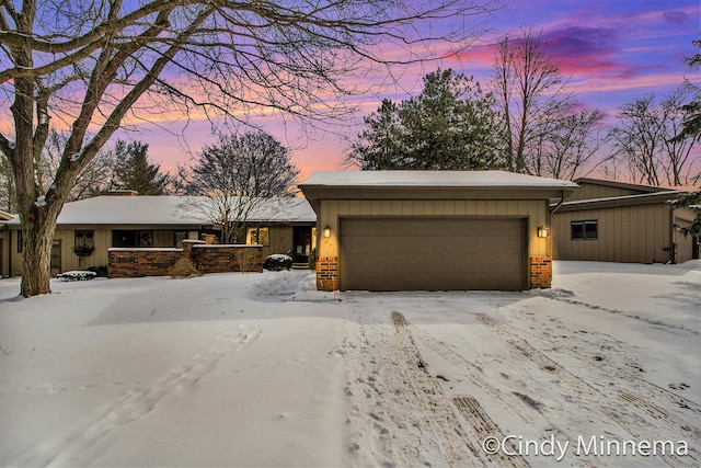 ranch-style home with a garage