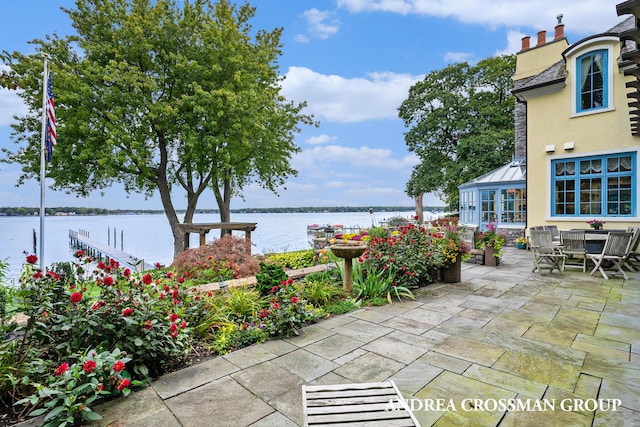 view of patio / terrace featuring a water view