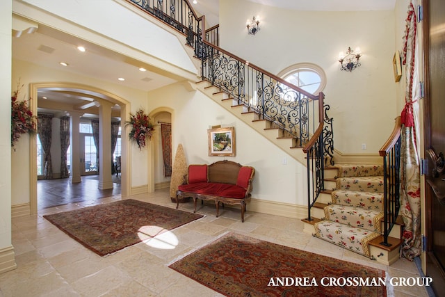 foyer entrance featuring a high ceiling