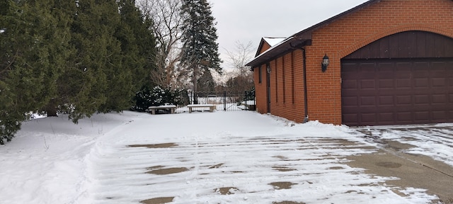 view of snow covered property