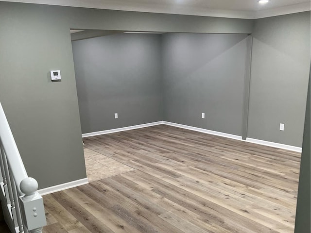 spare room featuring light hardwood / wood-style floors