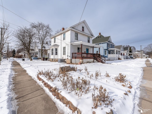 view of front of home featuring covered porch and central AC unit