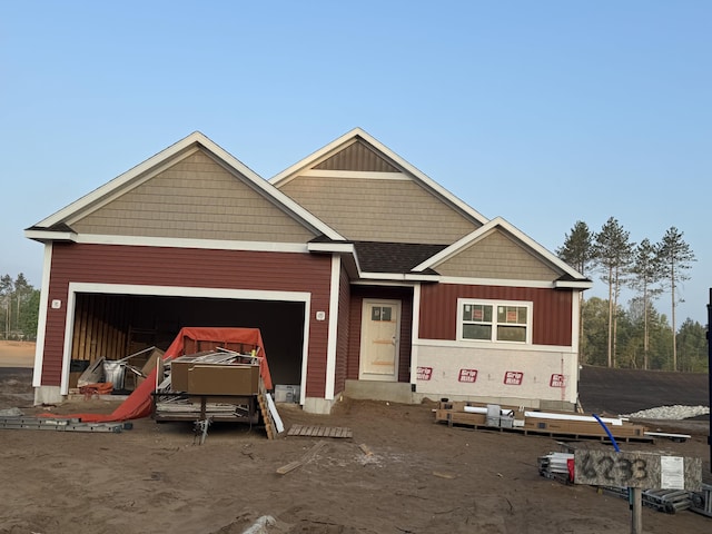 6233 Sturgeon Run, Muskegon, MI 49444 - view of front facade featuring a garage
