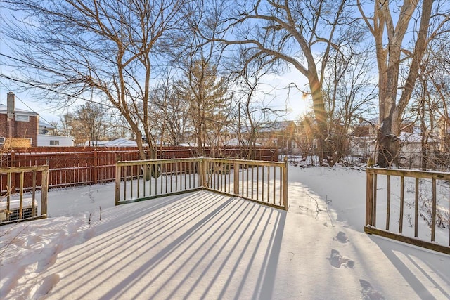 view of snow covered deck