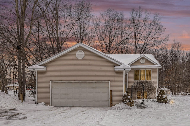 view of snow covered garage