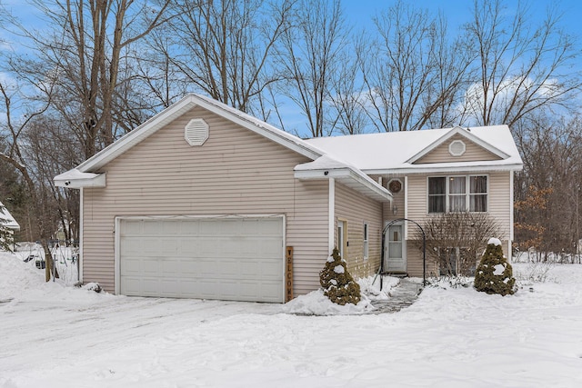 view of front of home with a garage