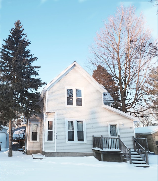 view of snow covered house