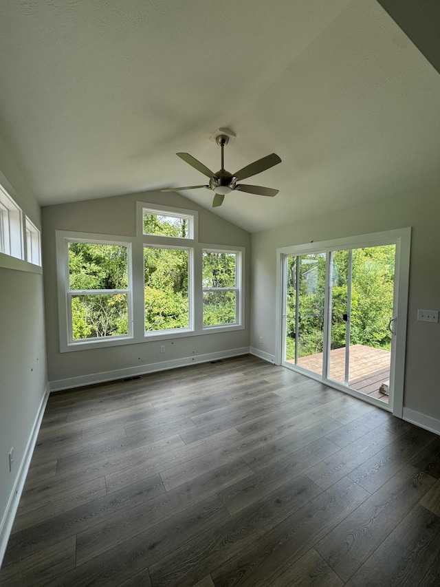273 Hickory Valley Dr, Kalamazoo, MI 49009 - unfurnished room featuring ceiling fan, baseboards, dark wood finished floors, and vaulted ceiling