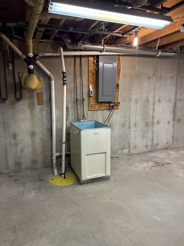 basement featuring electric panel