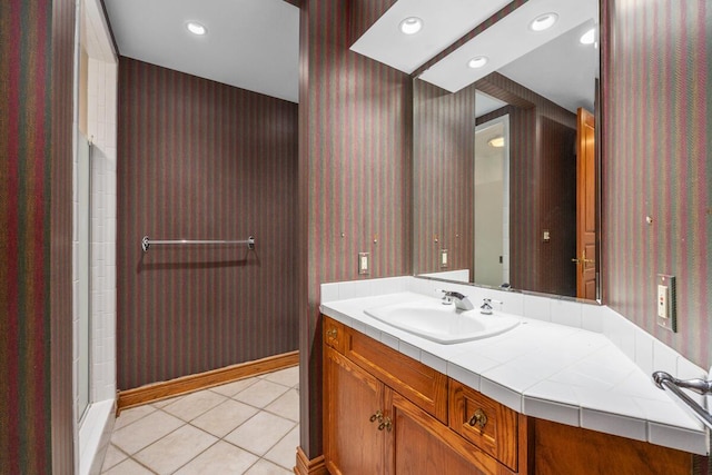 bathroom with vanity and tile patterned flooring