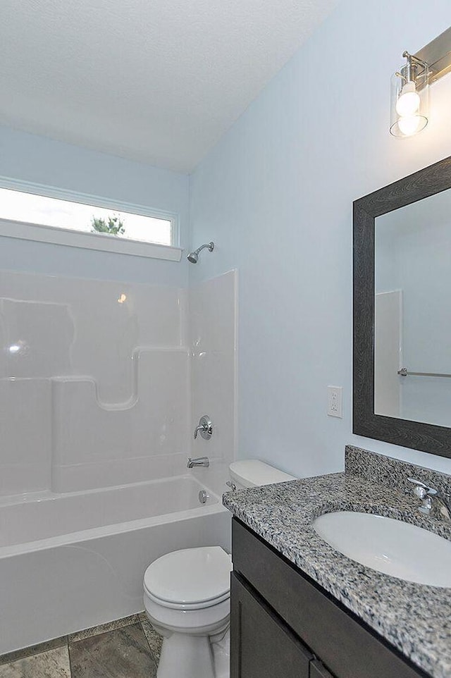 11968 Greenbriar Dr, Jerome, MI 49249 - full bathroom featuring shower / tub combination, toilet, and vanity