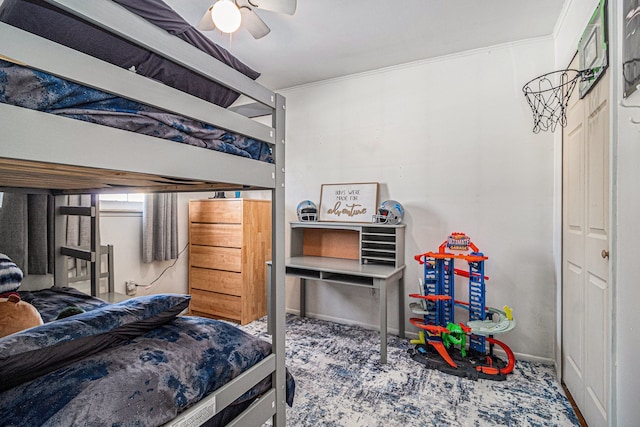 bedroom featuring a ceiling fan and crown molding