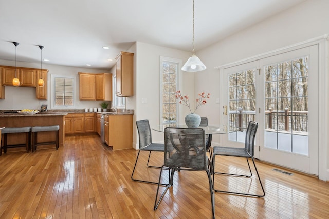 dining area featuring light hardwood / wood-style floors