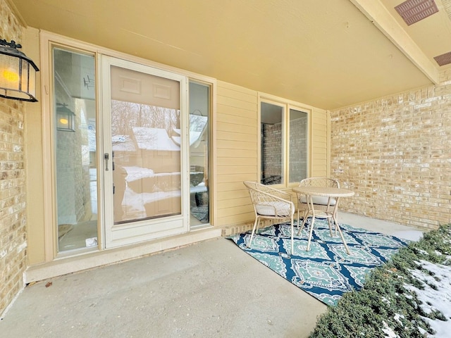 view of snow covered patio