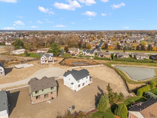 aerial view featuring a residential view and a water view