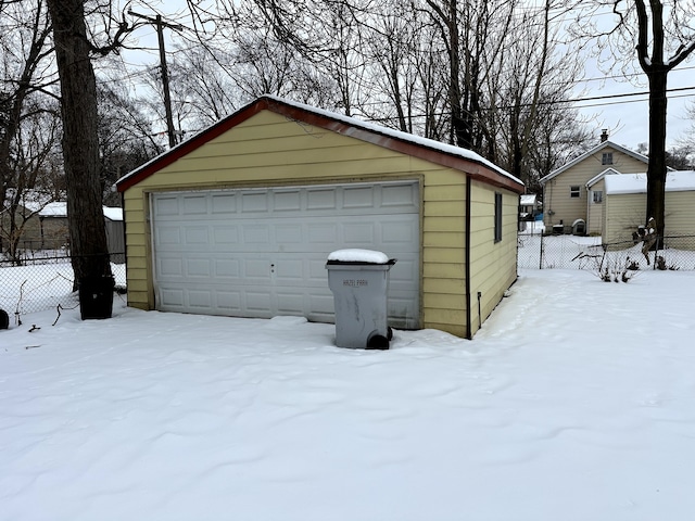 view of snow covered garage