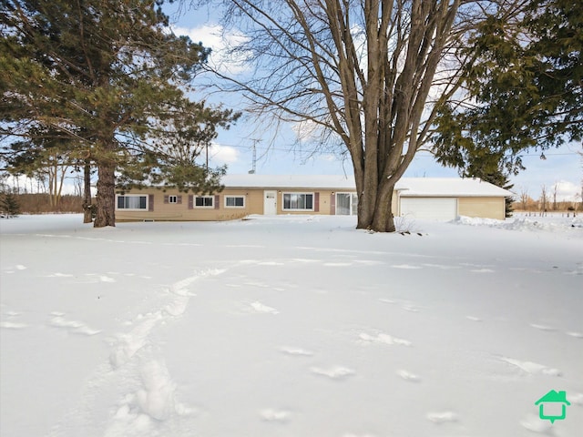 single story home featuring a garage