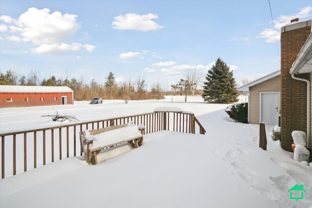 view of snow covered deck