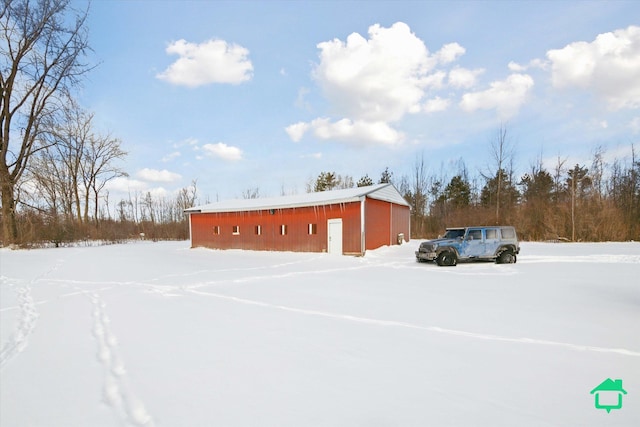 exterior space featuring a detached garage