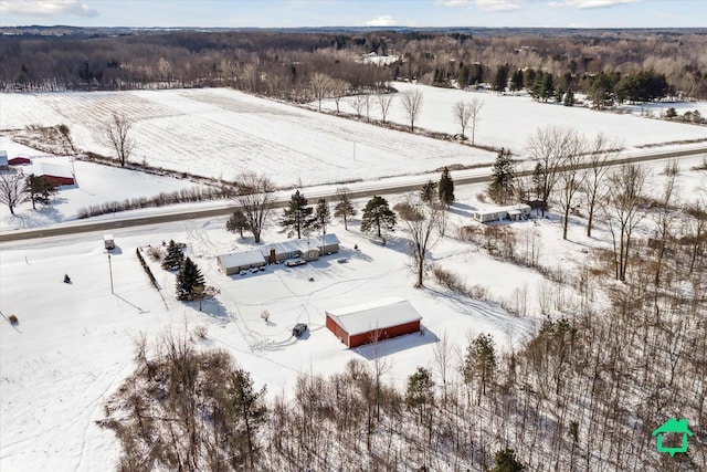 snowy aerial view featuring a rural view