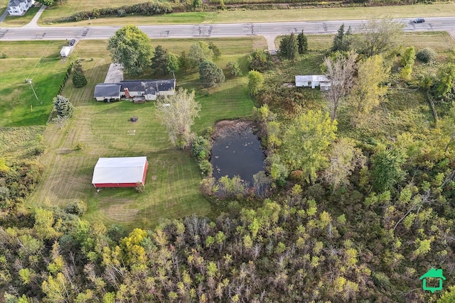 drone / aerial view with a rural view and a water view