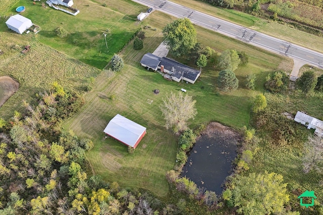 bird's eye view with a rural view and a water view