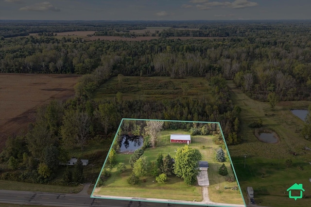 aerial view featuring a view of trees