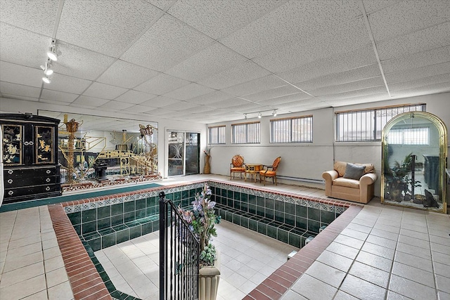 indoor pool with a hot tub