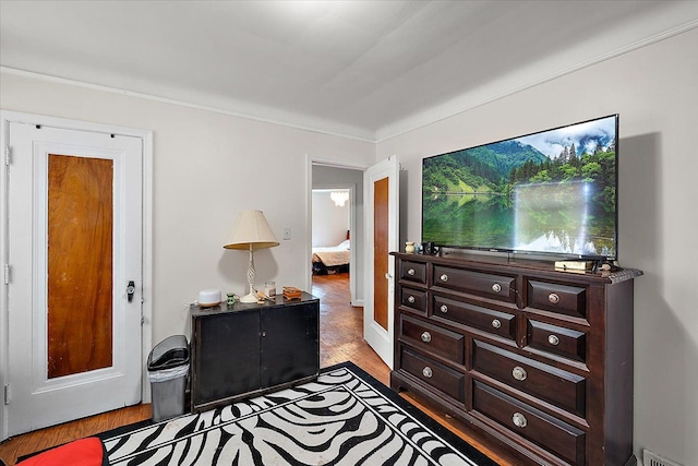 bedroom featuring light wood-style flooring