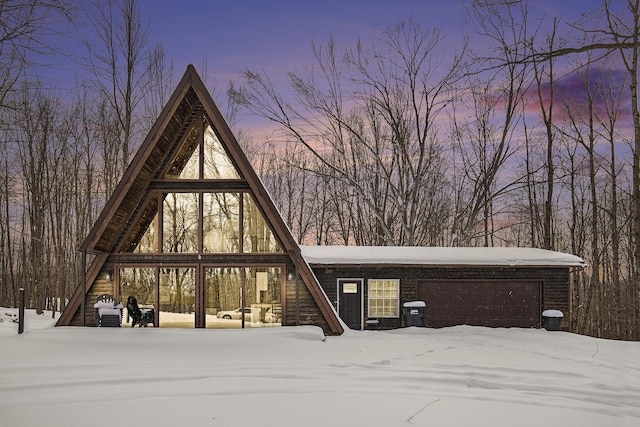 view of front of home with a garage