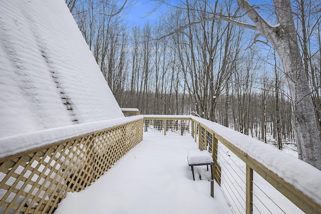 view of snow covered deck