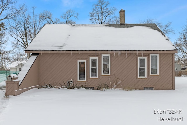 view of snow covered property